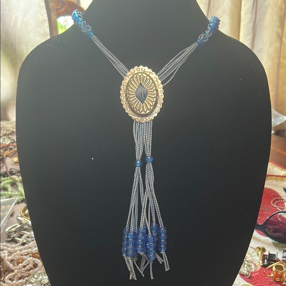 Blue and Silver Bolo Tie Necklace with Tassel Design